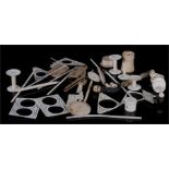 A Chinese ivory canton export sewing clamp and other ivory and bone items.