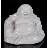 A Chinese Blanc de Chine figure of a seated buddha 9.5cm high