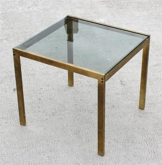 A 1970's smoked glass & brass occasional table, 50cm wide.