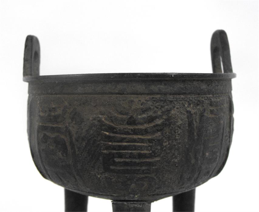 A Chinese bronze tripod censer, possibly Ming Dynasty (one leg replaced), 16cm high. - Image 2 of 8