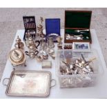 A large quantity of silver plate including a two handled tray, candelabra, tureen and flatware (2