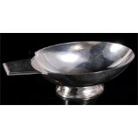 An Art Deco silver plated sauce boat designed by Christian Fjerdingstad for Christofle, 20cm wide.