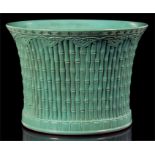 A Chinese turquoise glazed Bitong brush pot, modelled with a wide flaring rim with moulded bamboo to