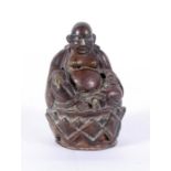 A Tibetan bronze Arhatt Buddha incense burner, 11cm high, and a Chinese bronze of an Immortal
