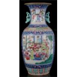 A large 19th century Chinese famille rose vase decorated with figures within panels with foliate