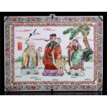 A Chinese Famille Rose porcelain plaque depicting three Immortals, with red seal mark, 31cm by 23cm.