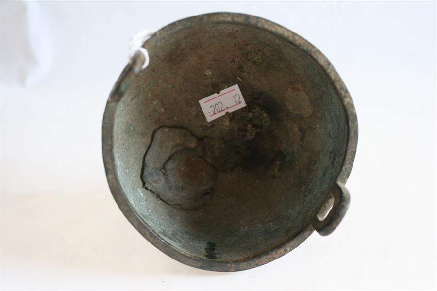 A Chinese bronze tripod censer, possibly Ming Dynasty (one leg replaced), 16cm high. - Image 6 of 8