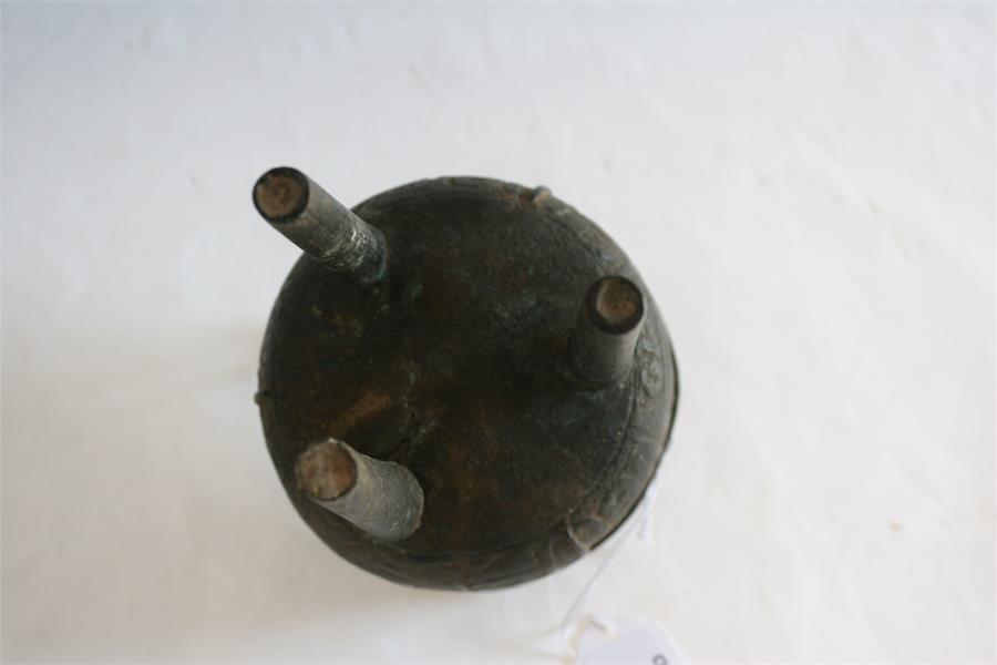 A Chinese bronze tripod censer, possibly Ming Dynasty (one leg replaced), 16cm high. - Image 3 of 8