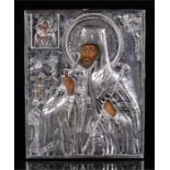 A 19th century Russian white metal (tests as silver) Icon, Oklad St. Dimitry Metropolitan of