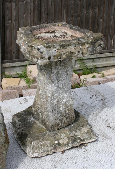 A three-part stone bird bath, 80cm high.