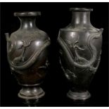 Two Japanese bronze vases decorated in relief with a coiled dragon (dragon heads missing) 36cm and