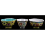 Two Chinese late Republic Period bowls decorated with flowers in enamel colours on a yellow
