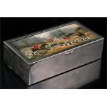 A silver plated table top cigarette box, with picture panel top depicting a fox hunting scene,