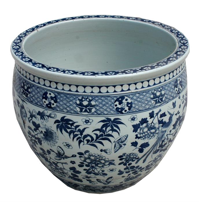 A large 19th century Chinese blue & white jardiniere decorated with birds and flowers in underglazed