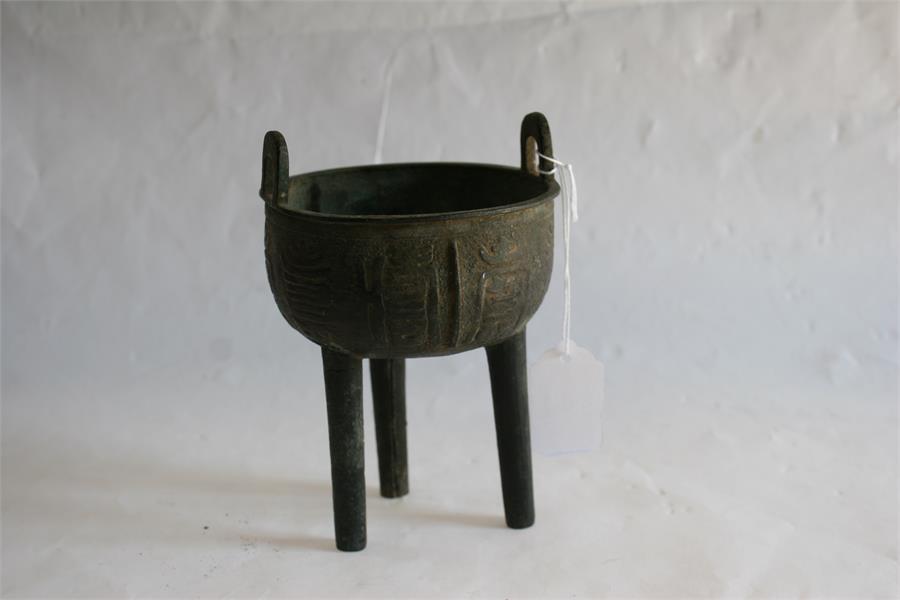 A Chinese bronze tripod censer, possibly Ming Dynasty (one leg replaced), 16cm high. - Image 7 of 8