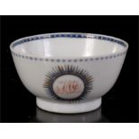 An 18th century Chinese export tea bowl, simply decorated with flowers and initialled to base, 9cm