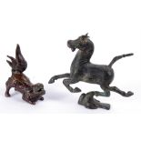 A Chinese Bronze of the Gansu Flying Horse, 11cm high; and a bronze Kylin, 9cm high (2).