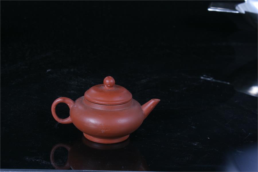 A Chinese Yixing pottery teapot with impressed mark to base, 5.5cm high. - Image 2 of 3