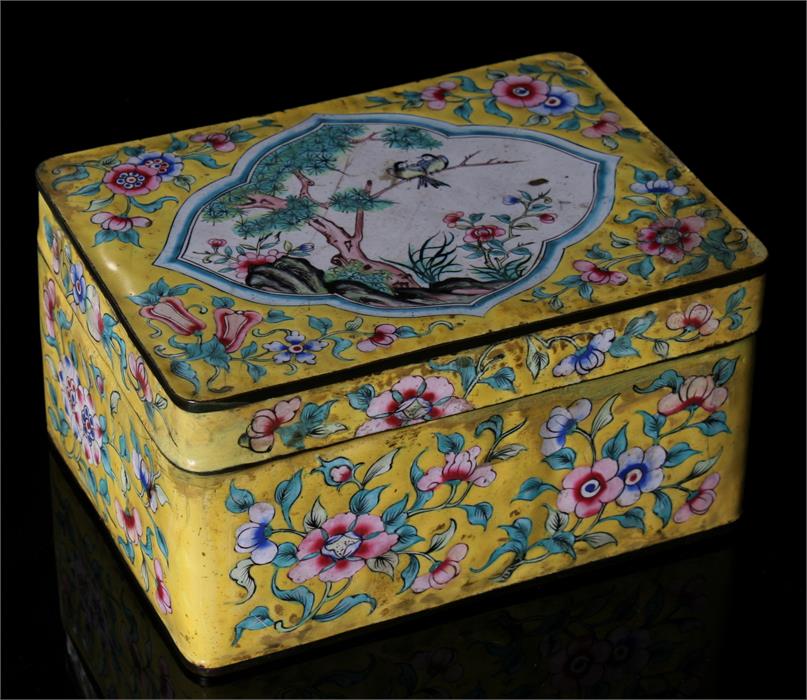 A Chinese yellow ground enamel lidded box decorated with flowers and birds in a tree, 15cm by