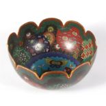 A Japanese Meiji Period cloisonne bowl, decorated with butterflies and flowers, 12.5cm diameter.