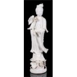 A 19th century Chinese Blanc-de-Chine figure of Guanyin, 48cm high (a/f).