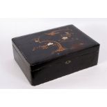 A late 19th century Japanese lacquered box, decorated with birds and flowers.