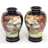 A pair of early 20th century Japanese Satsuma minature vases, decorated with figures and flowers