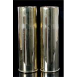 Two brass WWII artillery shell cases, 27cm high.