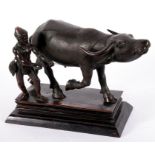 A Burmese Mandalay bronze group of an oxen and peasant, 27cm wide.