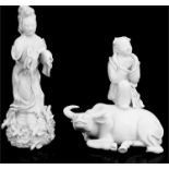 A Chinese Blanc de Chine figure of Guanyin, 16cm high; together with another Blanc de Chine figure