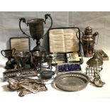 A large silver plated two handled trophy, flatware and other silver plated items (box).