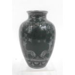 A baluster vase by Richard Ginori, with deer and flowers silver overlay decoration on a green