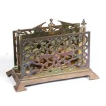 An Edwardian pierced brass two-division letter rack, 18cm wide.