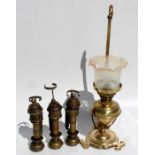 A brass table oil lamp (converted to electricity) and three railway lamps (4).
