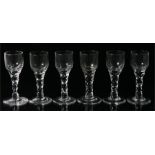 A set of six Georgian wine glasses with faceted stems, 14.5cm high.