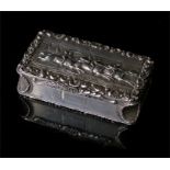 A fine quality William IV silver table snuff box, the hinged lid decorated in relief with three