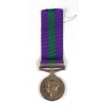 A Malaya General Service Medal, name removed.