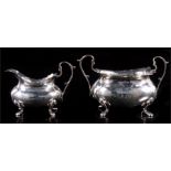 A Victorian silver sugar bowl and milk jug, makers Walker and Hall, Sheffield 1901, weight 147g.