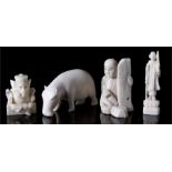 A late 19th century Japanese carved ivory figure of a carpenter, 4cm high, a Chinese ivory figure,