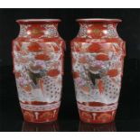 A pair of 19th century Japanese Kutani vases decorated with pheasants and peacocks, with gilt