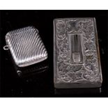 A silver vesta case, indistinct hallmarks, and a silver plated visiting card dispenser (2).