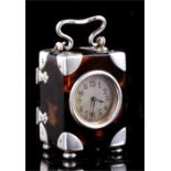 An Edwardian tortoiseshell & silver mounted miniature carriage clock, the silvered dial with