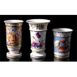 Three 19th century porcelain spill vases, each painted with flowers within gilt borders (3).