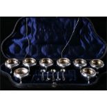 A Victorian cased set of eight silver plated salts & spoons (missing 3 spoons).