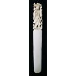 A 19th century Chinese ivory letter opener with carved figural handle, 24cm long.
