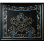 A Chinese silk embroidered collar depicting figures and flowers, framed and glazed, 72cm x 62cm