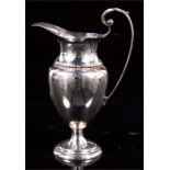 A silver jug, dated Birmingham 1925, 13cm high, weight 92g.