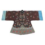 A Chinese ladies silk embroidered long robe, decorated with flowers and vases in a mirror image,