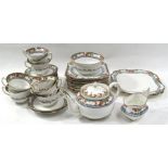 An Aynsley 'Orange Trees & Mountains' pattern 35-piece tea set.