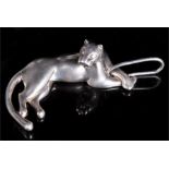 A Cartier solid silver reclining panther later converted to a pendant, signed Cartier to underside